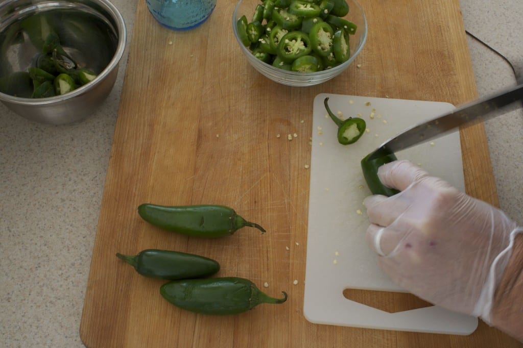 Slice jalapeños into 1/4" thick slices. Wear gloves.