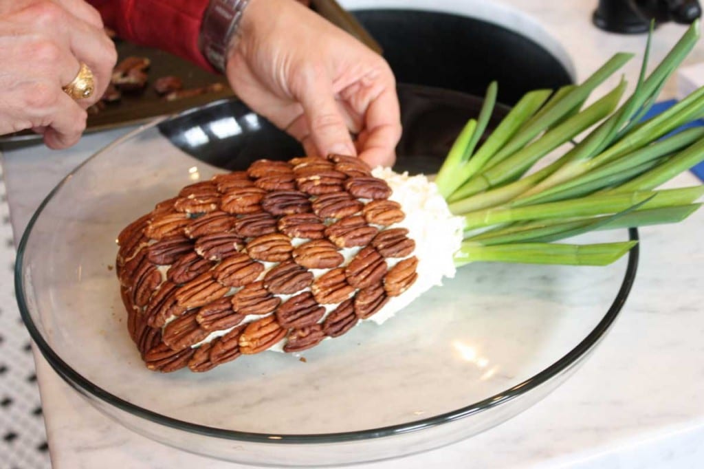 Arrange toasted and cooled pecans to look like a pineapple.